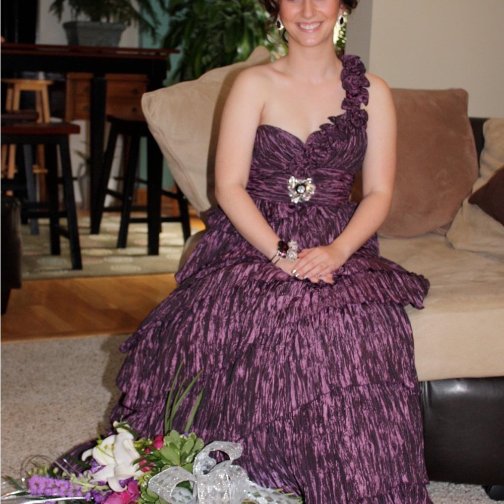 Purple satin micro pleat layered gown.